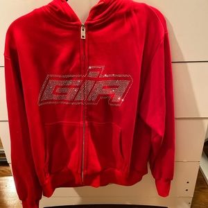 Red zip up I.AM.GIA sweatshirt with Diamond detail